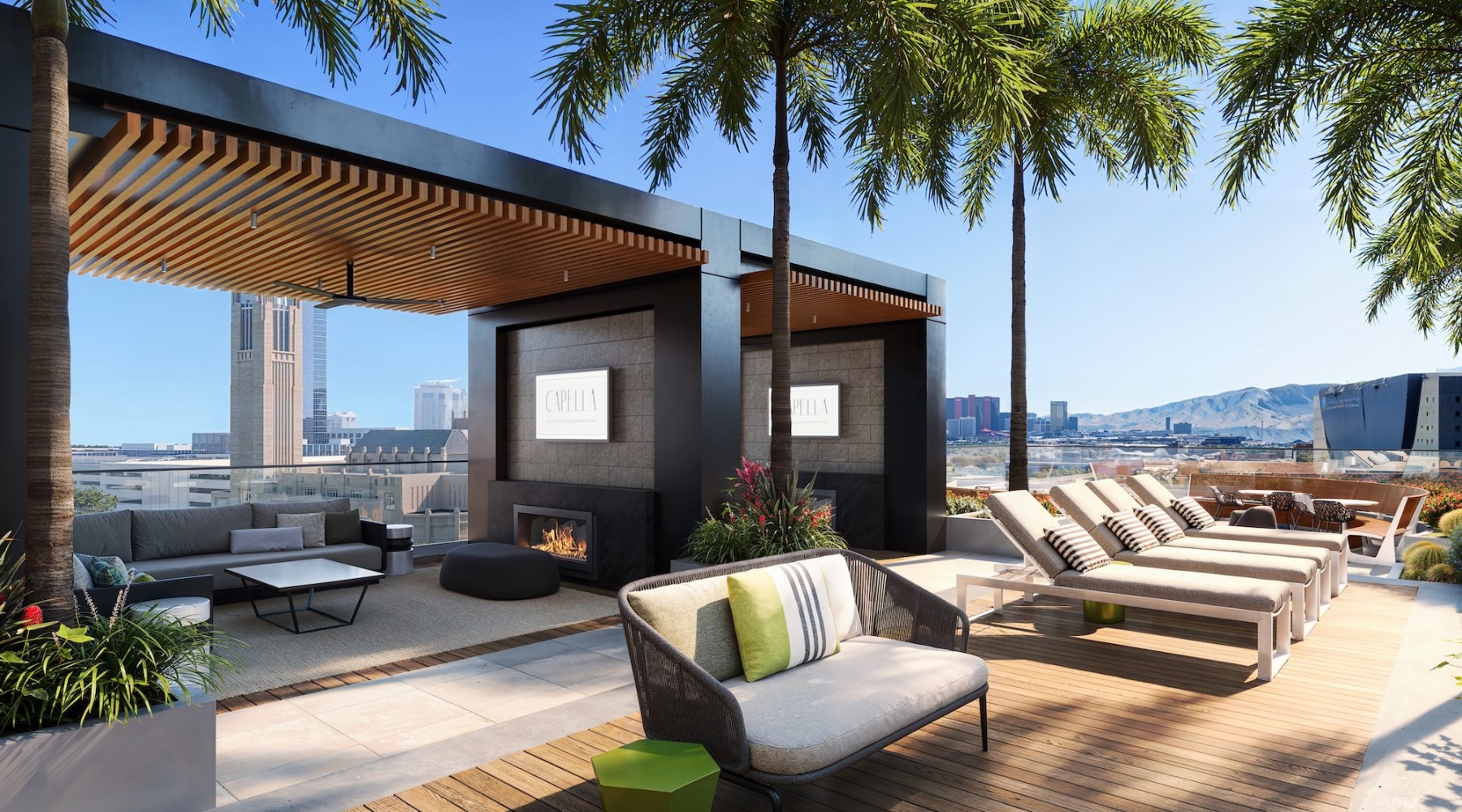 a patio with a fireplace and chairs
