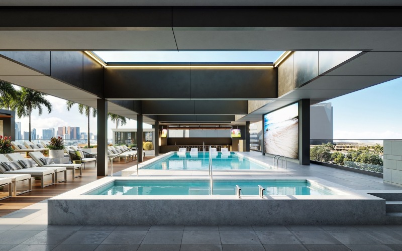 a swimming pool with a building in the background