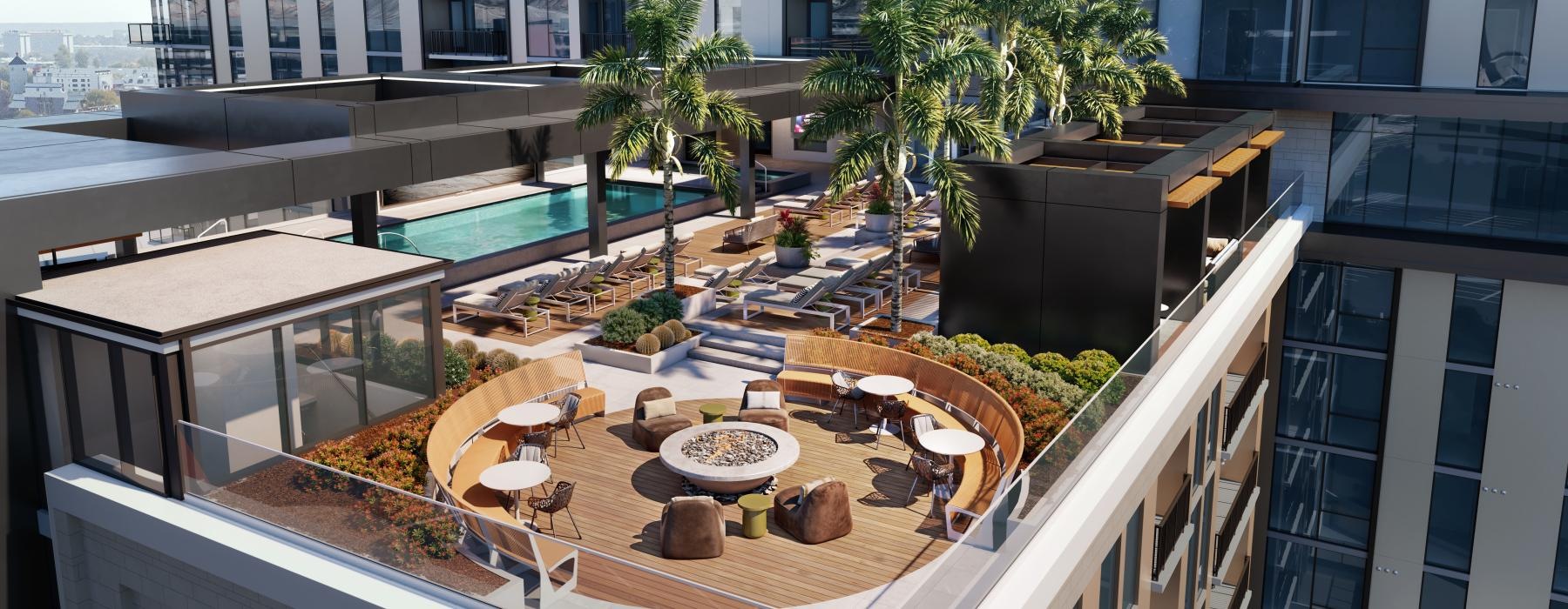 a pool and chairs outside a building