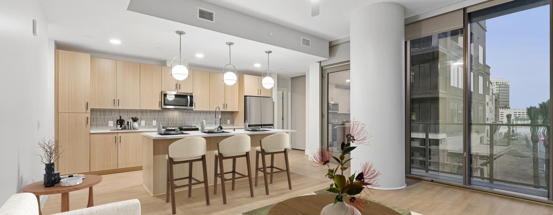 a large kitchen with a dining table
